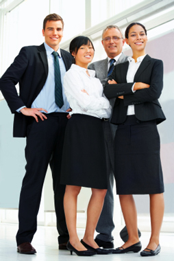 Smartly dressed relaxed business team